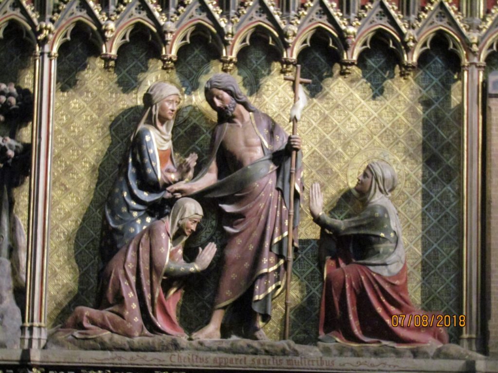 Scenes from the life of Christ, the risen Christ appears to the holy women, Wood painted panel inside Notre Dame Cathedral. Image by Lysandra Furstenberg