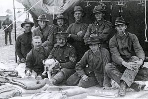 Members of the NZ Rifle Brigade with Caesar. Source Auckland War Memorial Museum 
