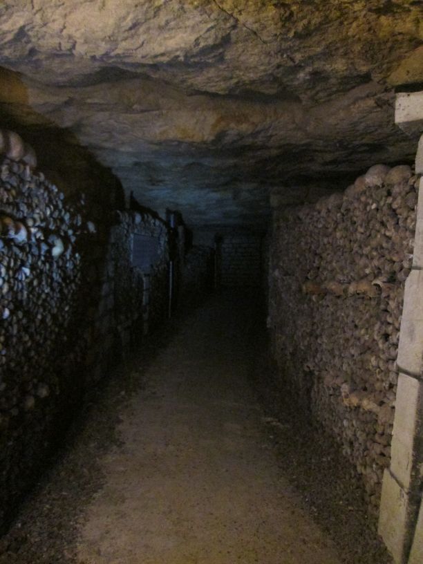 towards exit. Paris Catacombs