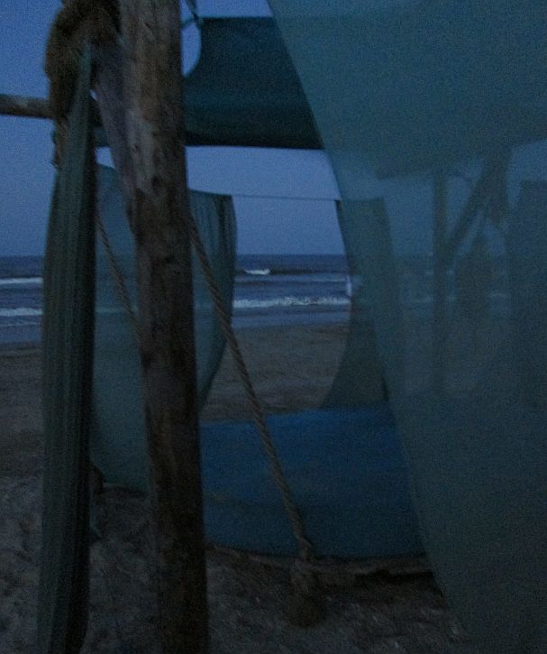 Travelling from Mountain top to Sea side, Doors and Stories of 2021 - the Black Sea after sunset, seen through floating curtains over a beach bed