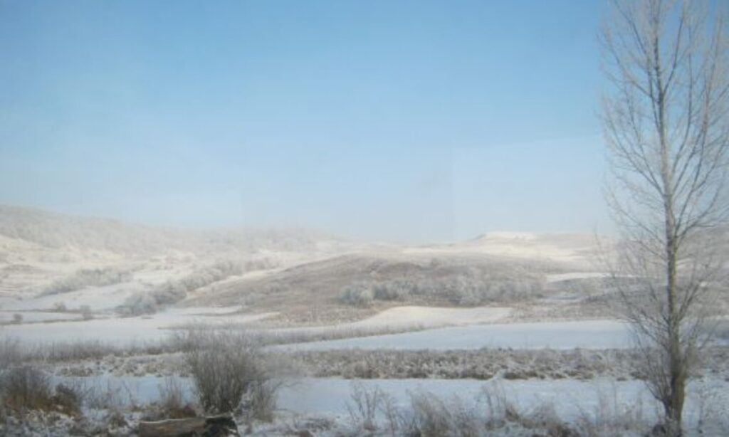 Celebrating December Romanian Legend, winter scene white hills Transylvania photography Patricia Furstenberg