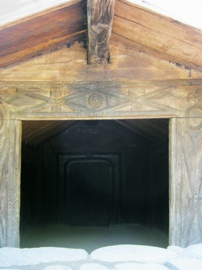 solar motif Romanian wooden door frame
