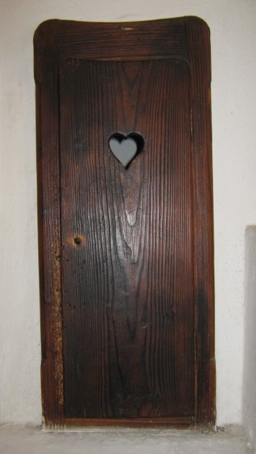 Bran Castle, a Historical Door Kept under Key for Centuries, a heart engraved on a door for Queen Maria