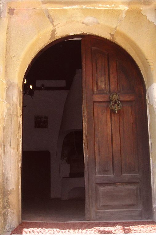 majestic Bran Castle entrance door with a door knocker
