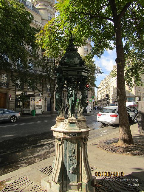 Paris Wallace Fountain Four Caryatides - mystical green water points, statues lurking in Parisian squares