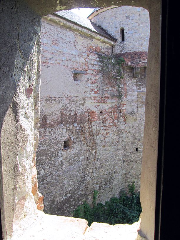 Corvin Castle, Window Slits and Telling Rocks, 100-Word Story - view of stony towers