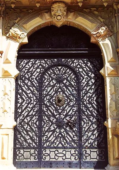 Peles Castle south locked wrought iron door close up