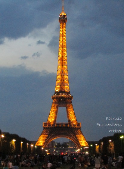Eiffel Tower lights up, summer night picnic 