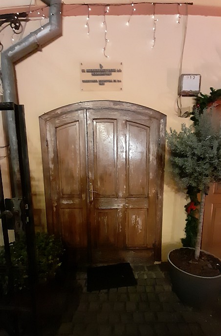 Sibiu whimsical wooden door near Huet Square