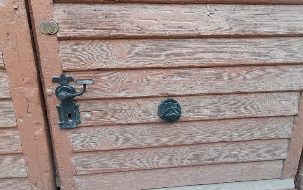Sibiu whimsy door knob on wooden panel door