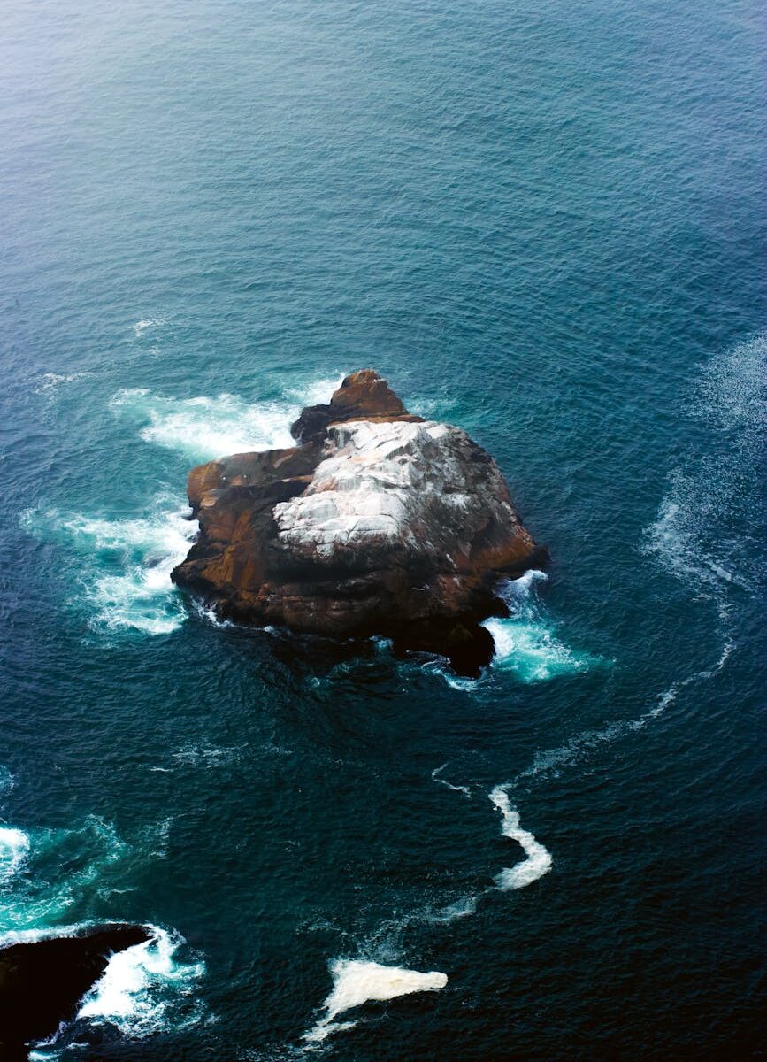 rocky island on sea shore