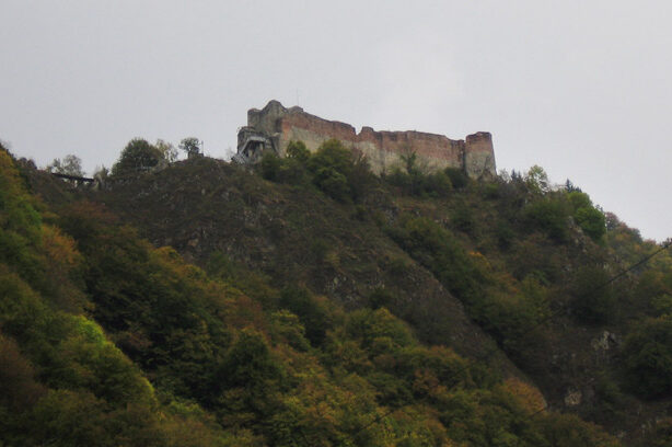 Poenari Castle today, a stone fortress atop a mountain peak overlooking Arges Gorge