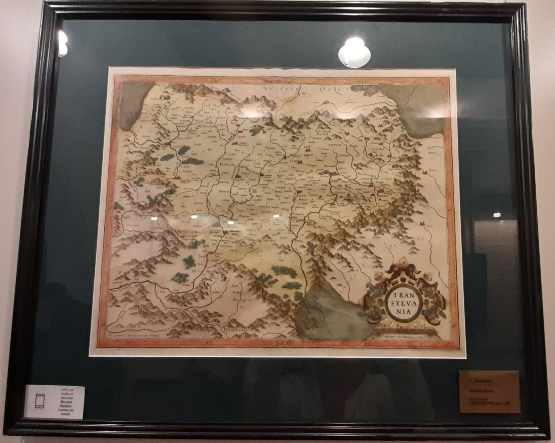 Map Museum16 century map of Transylvania by Gerardus Mercator, hand painted in red, yellow, green, brown watercolours