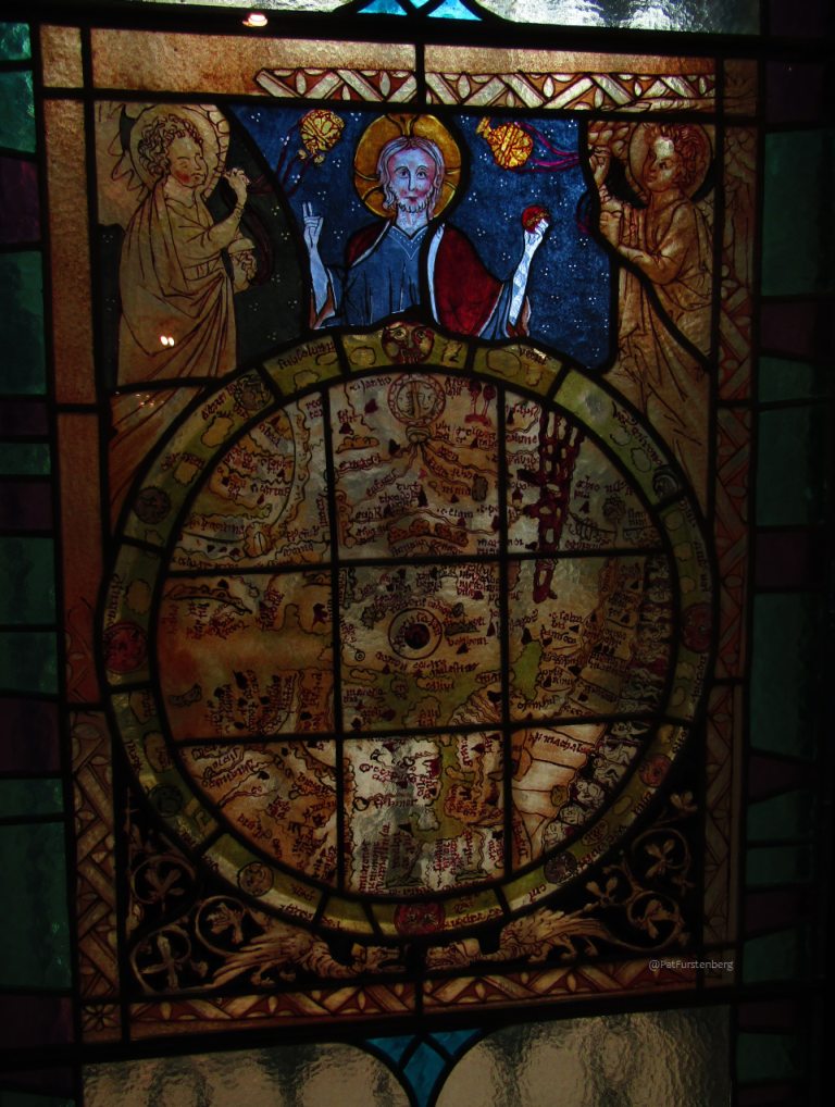 National Museum of Maps and Old Books Bucharest stained glass window, medieval Psalter World Map classic T-O map configuration overlooked by Jesus Christ flanked by angels