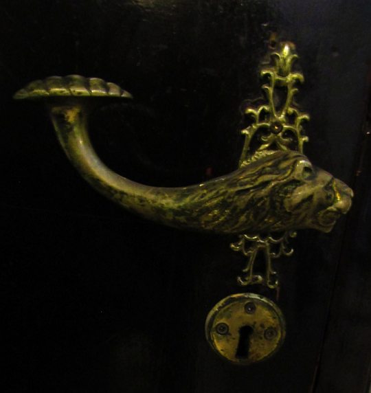 National museum of maps and ancient books, lion shaped brass door handle Lysandra Furstenberg 2022